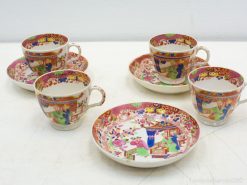 Vibrant vintage tea set with floral patterns, ideal for stylish gatherings and afternoon tea.