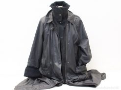 Stylish black Creenstone coat blending elegance and functionality for any occasion and weather.