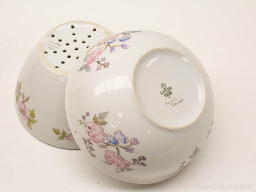 Elegant porcelain bowls with floral designs, perfect for decor or stylish everyday use.