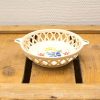 Beautiful vintage ceramic bowl with floral design, ideal for serving or decorative use.