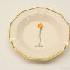 Elegant octagonal porcelain dish featuring a unique orange pulley design and sophisticated gold rim.