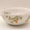 Elegant hand-painted ceramic bowl with botanical designs, perfect for decor or serving treats.