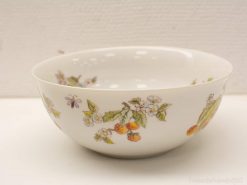 Elegant hand-painted ceramic bowl with botanical designs, perfect for decor or serving treats.