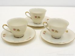 Elegant vintage teacups with floral designs and gold trim, perfect for stylish gatherings.