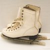 Elegant vintage size 44 ice skates in white leather, perfect for style and performance.