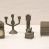 Charming vintage metal miniatures for collectors, dollhouses, and nostalgic decor.