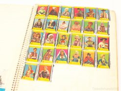 Vibrant trading cards display diverse traditional attire and cultural heritage from around the world.