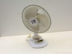 Retro table fan with elegant design and functional controls, perfect for nostalgic home decor.