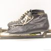 Classic vintage leather ice skates with metal blades, ideal for winter sports and nostalgia.