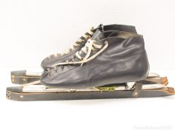 Classic vintage leather ice skates with metal blades, ideal for winter sports and nostalgia.