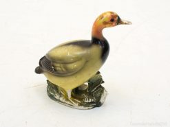 Charming vintage ceramic duck figurine with exquisite details, perfect for nature lovers and collectors.