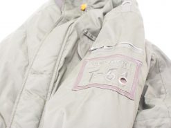 Stylish gray Tenson T-51 jacket, featuring weather resistance and practical pockets for outdoor adventures.