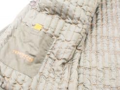 Tenson Dark Green Quilted Jacket: Stylish, lightweight, and functional for outdoor adventures.