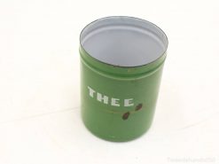 Vintage green tin can with white THEE lettering, ideal for decoration or storage.