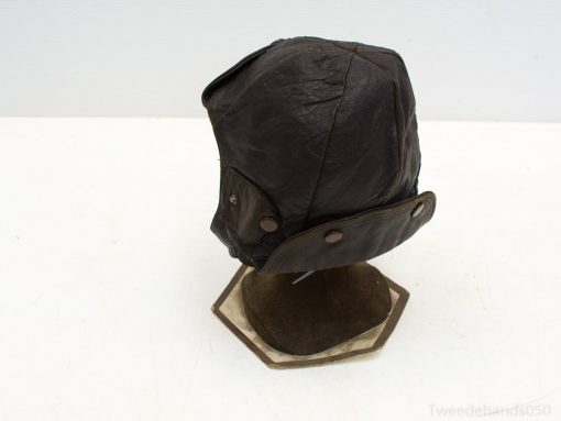 Vintage leather aviator cap showcasing classic design and timeless aviation heritage.