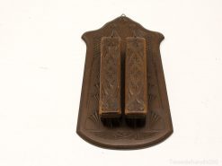 Elegant vintage wooden wall rack with intricate carvings, perfect for organization and decor.