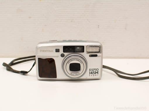 Stylish Pentax Espio 145M Super: vintage 1990s compact film camera with a powerful zoom lens.