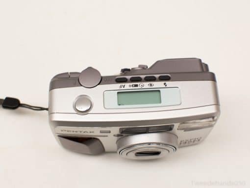 Sleek Pentax Espio 145M camera in silver, perfect for capturing timeless memories.