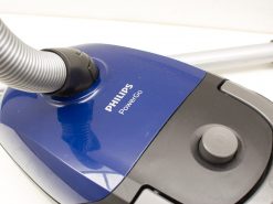 Philips PowerGo vacuum cleaner: sleek blue design with flexible hose for efficient home cleaning.