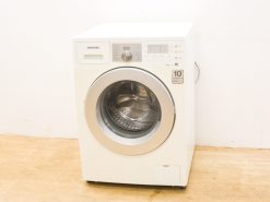 Sleek Samsung washing machine with 7kg capacity, transparent door, and 10-year warranty.