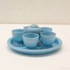 Charming vintage blue tea set for cozy gatherings and delightful moments with loved ones.