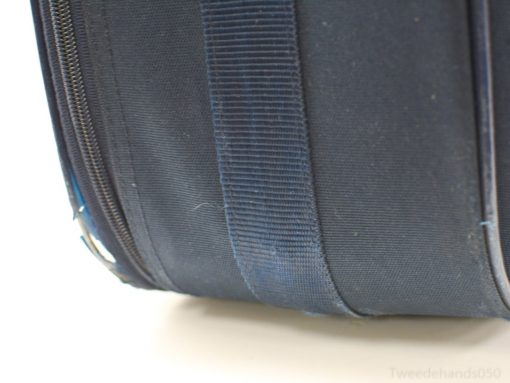 Vintage navy travel bag with character, durable fabric, and functional design for stylish adventures.