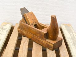 Vintage wooden hand plane, a symbol of craftsmanship for precision woodworking projects.