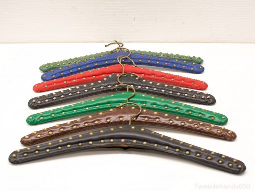 Colorful vintage hangers add style and charm to any wardrobe or display space.