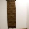 Handmade earthy vintage tapestry with intricate brown and gold patterns, perfect for warm decor.