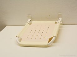 Foldable cream shower seat for safety and comfort in small bathrooms.