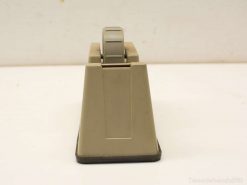 Classic beige stapler with ergonomic design and non-slip grip for office use.