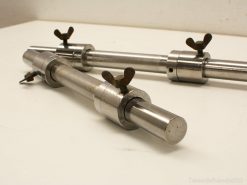 Shiny cylindrical metal rods with wing knobs for adjustable, professional engineering applications.