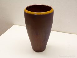 Contemporary dark brown vase with striking yellow rim, perfect for stylish home decor.