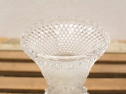 Elegant crystal vase with geometric design, perfect for floral arrangements and home décor.