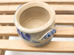 Handmade ceramic pot with blue floral design, ideal for decoration and everyday use.