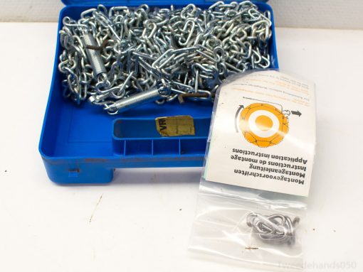 Blue storage box with assorted metal chains and fasteners for construction and securing items.