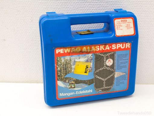 PEWAG Alaska-Spur tire chains in durable blue case for winter traction and safety.