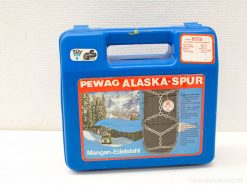 PEWAG Alaska-Spur tire chains in durable blue case, ideal for winter driving and safety.