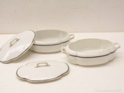 Charming white porcelain serving dishes set, perfect for elegant dining and festive occasions.