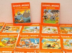 Vintage Suske en Wiske comics collection with colorful covers and whimsical adventure stories.