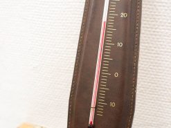 Vintage wooden thermometer with red liquid, measuring temperatures from 0 to 20 degrees Celsius.