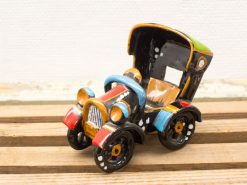 Colorful vintage car figurine adds nostalgic charm to any decor. Perfect for collectors!