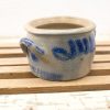 Vintage gray pottery margarine crock with blue accents and charming looped handles.