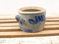 Vintage gray pottery margarine crock with blue accents and charming looped handles.