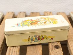 Vintage yellow tin box with horse-drawn carriage illustrations, perfect for collectors and décor.