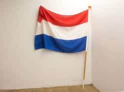 Vibrant Dutch flag with tricolor design, showcasing red, white, and blue against a clean backdrop.