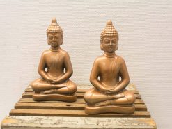 Serene dual Buddha sculptures for meditation, exuding tranquility and wisdom in your space.