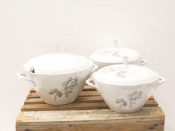 Elegant ceramic tureens with floral design, perfect for stylish serving of soups and stews.