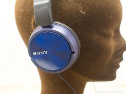 Stylish Sony headphones in glossy blue offer comfort and quality for audiophiles and casual listeners.