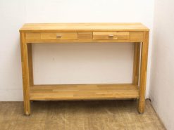 Elegant light wood console table with drawers, perfect for stylish storage and decoration.